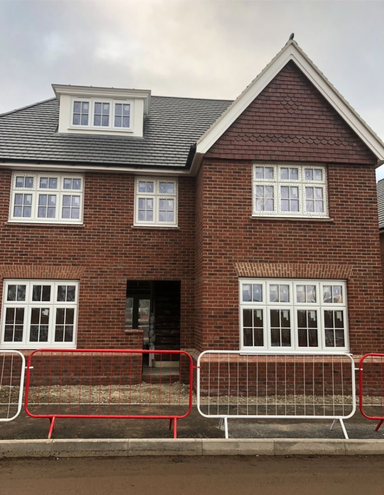 Detached new build home at Aston-on-Trent in red brickwork with soldier course heads
